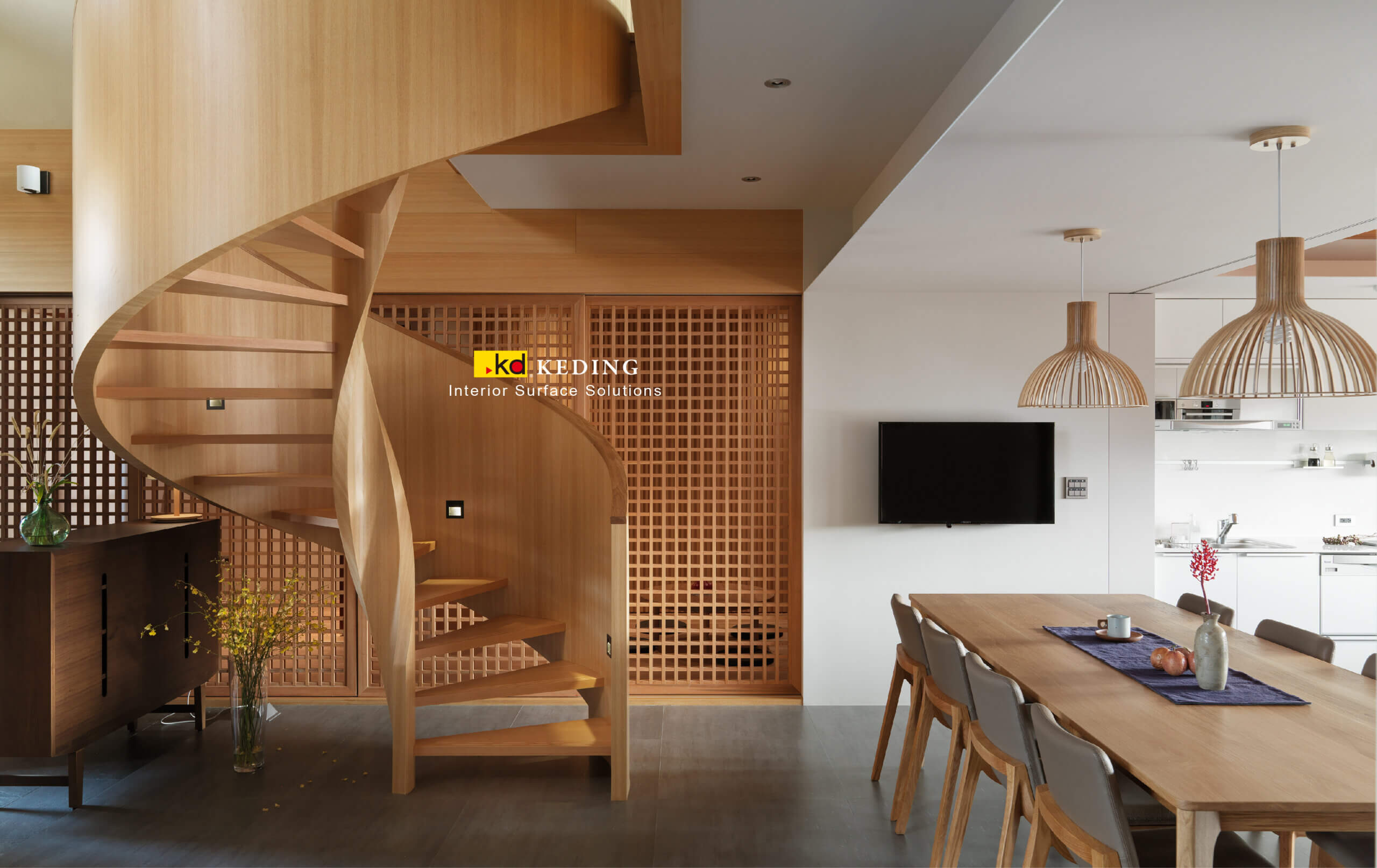 A stylish spiral staircase smoothly wrapped in KD ECO⁺ flexible laminates, blending seamlessly into modern interiors.